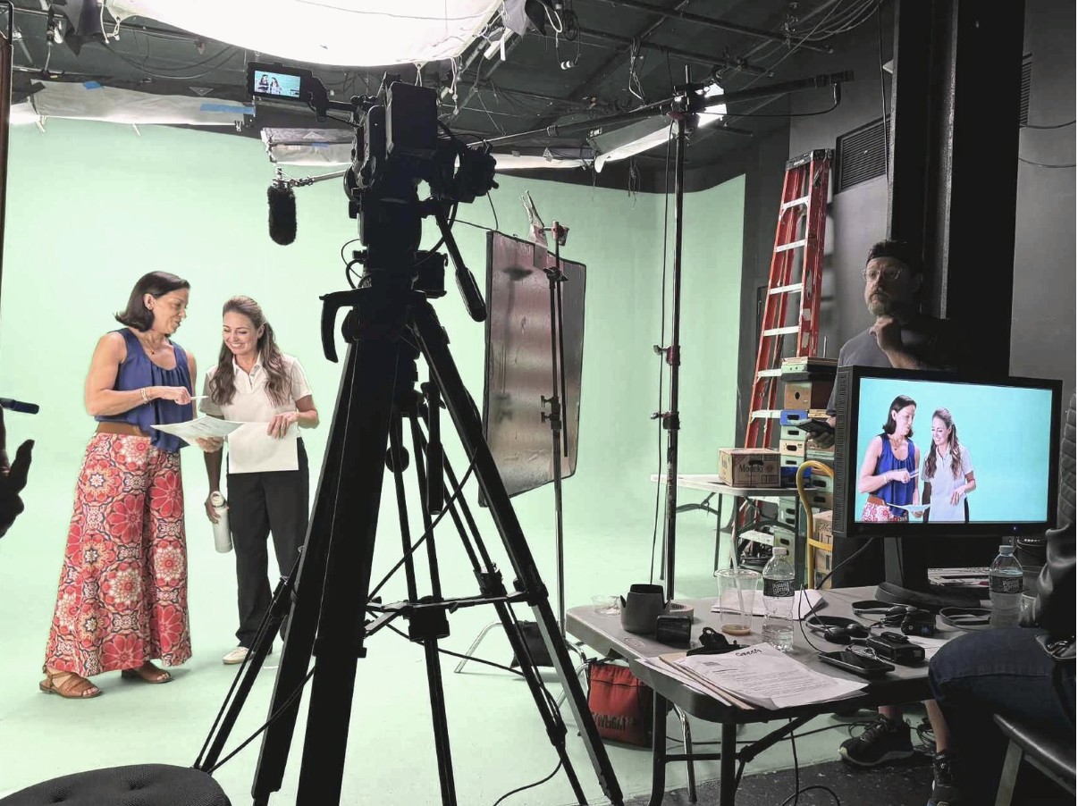 Production crew and talent on set during a shoot